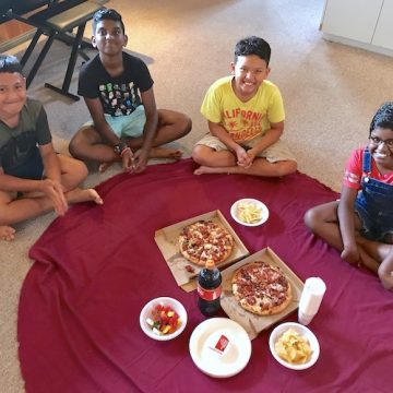 Left to right – Kilifi, Jon, William and Jennifer at the end of year Beginner Piano Course pizza party.